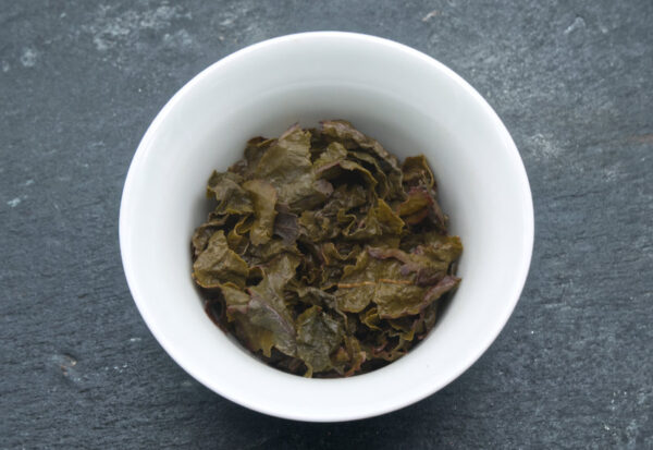 Feuilles infusées du Tie Guan Yin Traditionnel