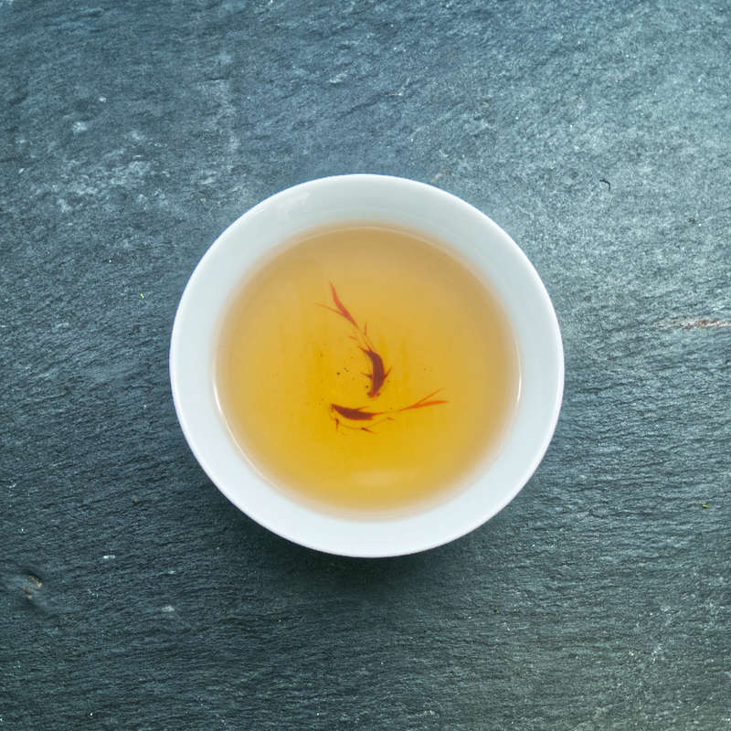 Tasse de Lapsang Souchong Traditionnel, liqueur cuivre orangée
